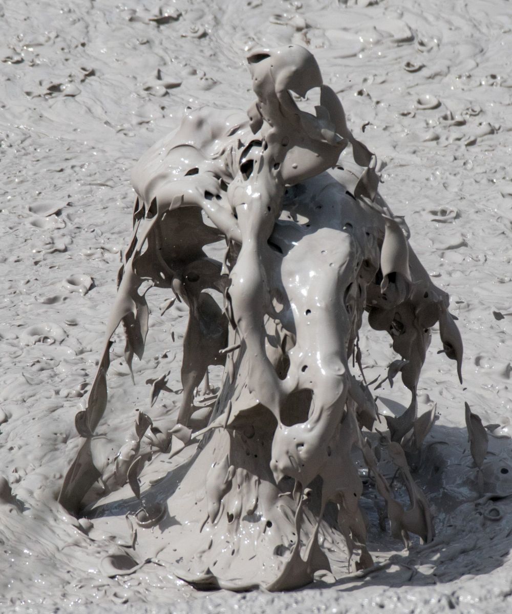 Boiling mud pool, frozen mid-splash